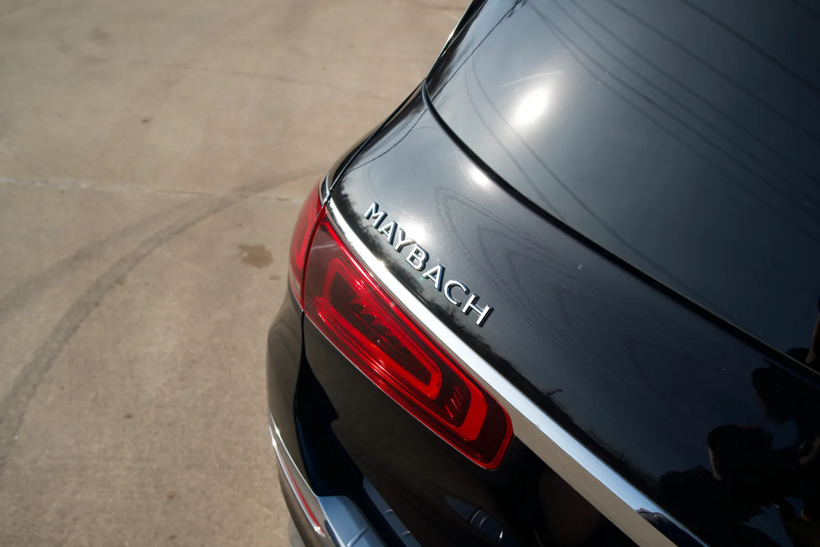 Deep gloss on the rear quarter of a ceramic-coated black Maybach